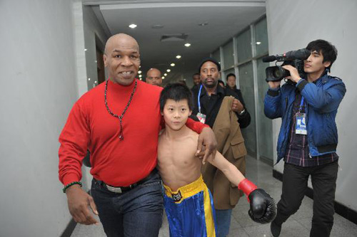 Former world boxing champion Mike Tyson visits N China