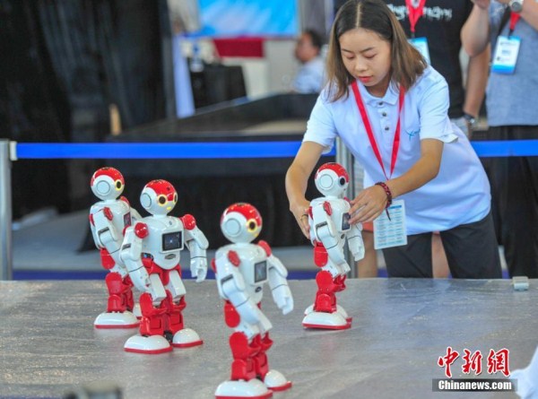 Robots take center stage at Shenyang manufacturing expo