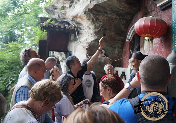 French tourists enjoy the charm of Wudang