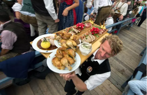 Revelers say 'prost' at Kunming's Oktoberfest