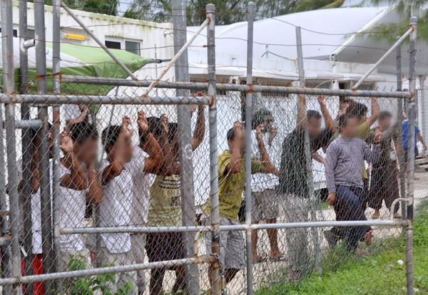Asylum-seekers win legal damages