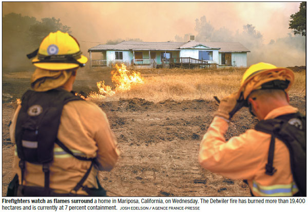 Thousands flee as wildfire explodes in size