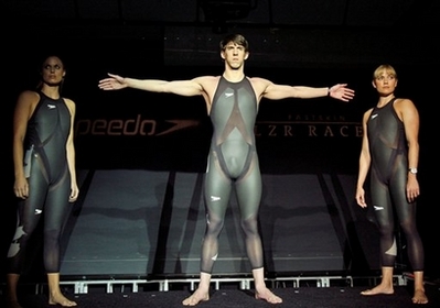 American Olympic medalists Amanda Beard, left, Natalie Coughlin, right, and Michael Phelps pose with in new, high technology Speedo LZR Racer swimsuits they will wear during the Beijing Summer Olympics this summer during a news conference introducing the suits in New York, Tuesday, Feb. 12, 2008. [Agencies]