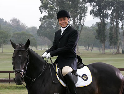 Jackie Chan rides a horse in this photo taken on Feb.11, 2008, seen in his official blog, as he films a promotional video for the 2008 Olympic equestrian events