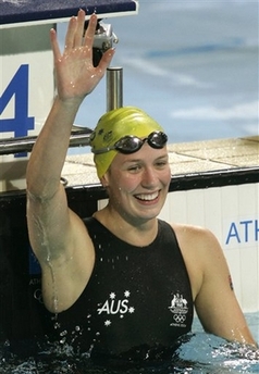 Jodie Henry of Australia celebrates after winning the gold medal in the 100m freestyle at the Olympic Aquatic Centre during the 2004 Olympic Games in Athens, in this Aug. 19, 2004 file photo. The world record holding swimmer said Friday, Feb. 29, 2008 that she won't defend her 100-meter freestyle Olympic title in Beijing due to an injury. [Agencies]