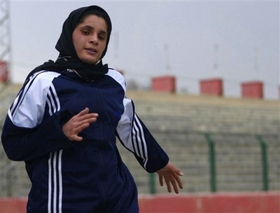 Mehbooba Ahadyar 19, an Olympic track star runs during practice session at a Ghazi Stadium in Kabul, Afghanistan, Monday , March 10, 2008. Ahdyar is the only female on Afghanistan's four-person Olympics team to compete at the 2008 Beijing Olympics. [Agencies]