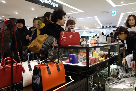 Why are Chinese obsessed with luxury goods?