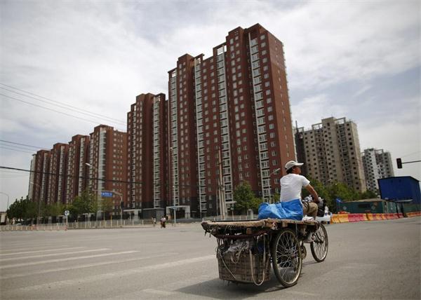 Migrants rushing to megacities pushing up housing prices there