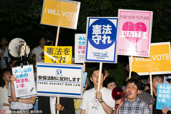 Japan's protest aimed at helping Abe revise pacifist Constitution