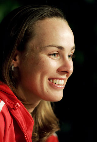 Martina Hingis of Switzerland smiles during a news conference at the Pacific Life Open tennis tournament in Indian Wells, California March 8, 2006. [Reuters]
