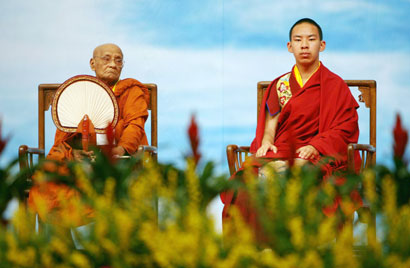 Gyaltsen Norbu (R), known as the Panchen Lama, and Grantha Visarada Rajakiya Pandita, supreme prelate of Sri Lanka, attend the opening ceremony of the World Buddhist Forum in Hangzhou, Zhejiang province in east China April 13, 2006. 