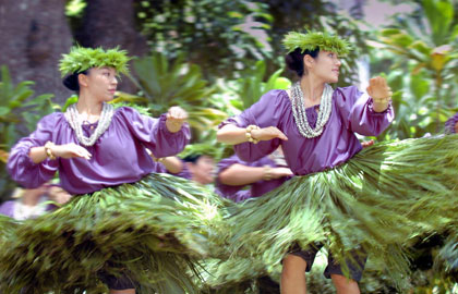 Dancers from the Halau Kekuaokalaaualailiahi of Wailuku, Maui, compete in the 29th Annual Prince Lot Hula Festival held by the Moanalua Gardens Foundation outside Honolulu, Hawaii, on July 8, 2006. The festival is named after Prince Lot, who reigned as King Kamehameha V from 1863 to 1872 in Hawaii.