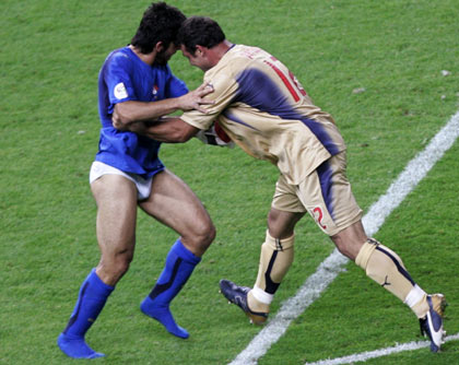 Italy's Fabio Cannavaro lifts the World Cup Trophy after the World Cup 2006 final soccer match between Italy and France in Berlin July 9, 2006. [Reuters]