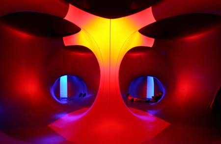 Festival goers relax inside a 3-D Luminarium inflatable installation by British designer Alain Parkinson during Budapest's one-week, round-the-clock Sziget ('Island') music festival on an island in the Danube river August 13, 2006. 