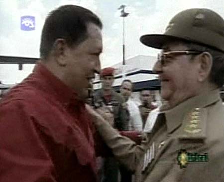 Venezuela's President Hugo Chavez (L) is greeted by Cuba's acting President Raul Castro as he arrives in Havana August 13, 2006. Castro appeared in public for the first time on Sunday, receiving Chavez, Cuban state television images showed. 