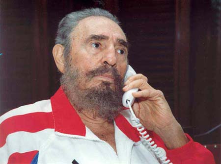Cuban leader Fidel Castro speaks on the telephone in this undated photo released on August 13, 2006. A Cuban newspaper on Sunday published the first photographs of Fidel Castro since his stomach surgery and the Cuban leader said he had stabilized "considerably" but was not out of the woods
