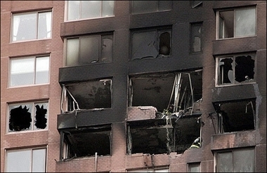 An apartment building is damaged following the crash of a small plane into the high-rise on the east side of Manhattan in New York. A small aircraft piloted by US baseball player, Cory Lidle of the NY Yankees, crashed into a high-rise apartment building in Manhattan, killing two people and triggering memories of the September 11 attacks of five years ago