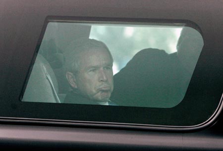 U.S. President George W. Bush arrives in his car at Andrews Air Force base near Washington, October 19, 2006. 