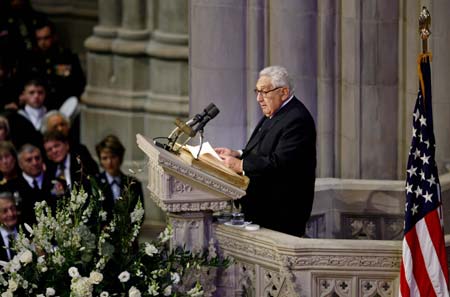 Former U.S. Secretary of State Henry Kissinger delivers a tribute to former U.S. President Gerald Ford during Ford's state funeral at the National Cathedral in Washington January 2, 2007.
