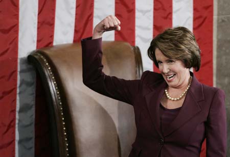 U.S. Speaker of the House Nancy Pelosi (D-Ca) reacts as she takes the podium for the first time after being elected the first ever female Speaker of the U.S. House of Representatives on the first day of the 110th Congress in Washington, January 4, 2007. 