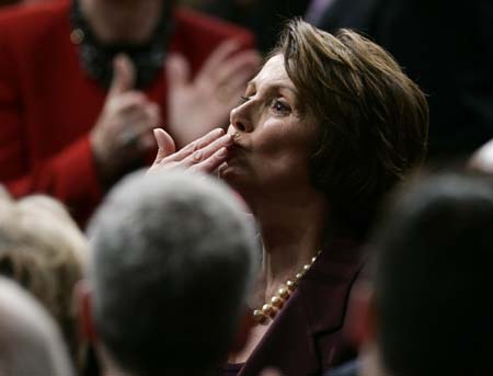 Incoming U.S. Speaker of the House Nancy Pelosi (D-Ca) blows a kiss from the House floor shortly before being elected the first ever female Speaker of the House on the first day of the 110th Congress in Washington, January 4, 2007.