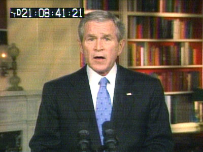 U.S. President George W. Bush discusses his new plan for Iraq during a nationally televised address from inside the White House Library in Washington, in this frame grab on January 10, 2007.