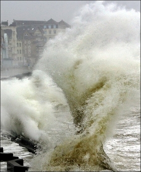 Huge waves in the port of Wimereux, northern France. A severe storm front has battered the British Isles and Germany, causing havoc with shipping and leaving one man dead in England, with forecasters predicting worse weather to come.(AFP/Philippe Huguen) 