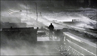 A man stands in strong winds in Malmo. Three people were killed in southern Sweden in severe storms that disrupted air, rail and road traffic and caused a power cut, the TT news agency quoted police as saying.(AFP/SCANPIX/Johan Nilsson) 