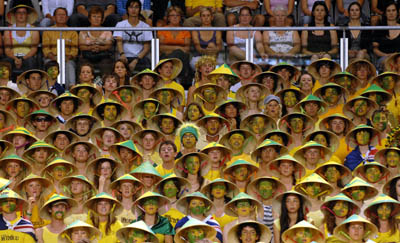 Tennis supporters watch play between Martina Hingis of Switzerland and Alla Kudryavtseva from Russia during her second round women's singles match at the Australian Open tennis tournament in Melbourne. Hingis defeated Kudryavtseva 6-2. 6-2. [AFP]