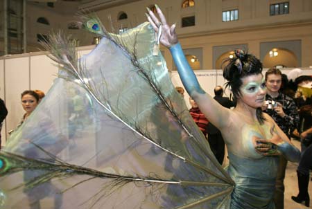 A model gets ready for the Tenth Moscow Championship of Hairdressers and Nail Art Designers in central Moscow, January 26, 2007. Over 300 artists are competing in the show, till the finals on Saturday. 