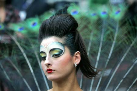 A model gets ready for the Tenth Moscow Championship of Hairdressers and Nail Art Designers in central Moscow, January 26, 2007. Over 300 artists are competing in the show, till the finals on Saturday. 