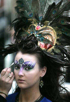 A model gets ready for the Tenth Moscow Championship of Hairdressers and Nail Art Designers in central Moscow, January 26, 2007. Over 300 artists are competing in the show, till the finals on Saturday. 