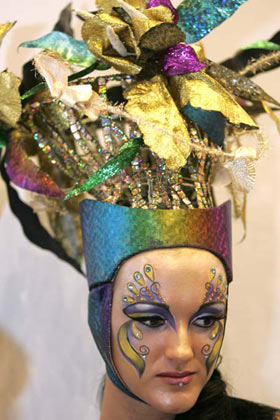 A model gets ready for the Tenth Moscow Championship of Hairdressers and Nail Art Designers in central Moscow, January 26, 2007. Over 300 artists are competing in the show, till the finals on Saturday. 