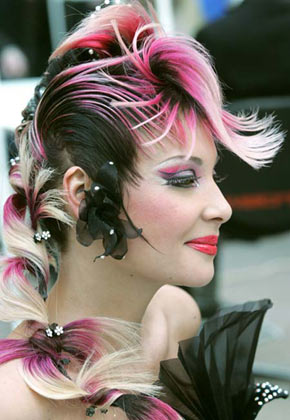A model gets ready for the Tenth Moscow Championship of Hairdressers and Nail Art Designers in central Moscow, January 26, 2007. Over 300 artists are competing in the show, till the finals on Saturday. 