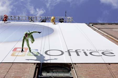 Sixteen aerialists perform on a giant billboard at the the launch of Windows Vista and Microsoft Office in New York January 29, 2007. The performance featured an original score from the new Windows Vista soundtrack.