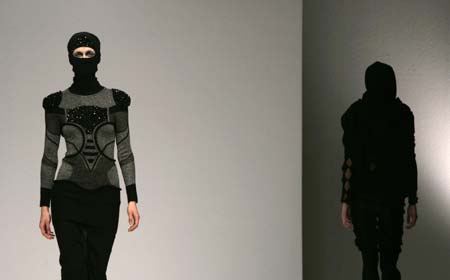 Models wear creations by Louise Goldin for Fashion East during 2007 Autumn/Winter show at London Fashion Week February 12, 2007. 