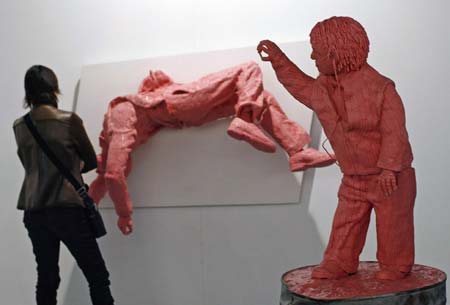A visitor looks at an artwork at Madrid's international contemporary art fair ARCO February 14, 2007. 