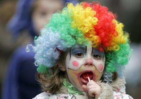 A young reveller watches a Carnival parade in Oviedo, northern Spain, February 24, 2007. 