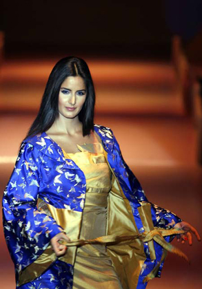 Bollywood actress Katrina Kaif displays an outfit by Indian designer Narendra Kumar during the grand finale of India fashion week in Mumbai March 31, 2007.