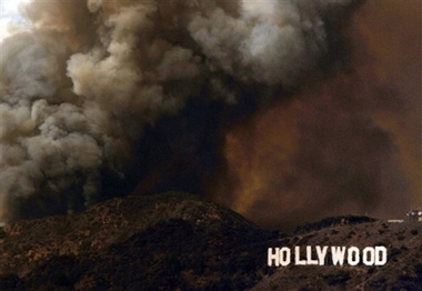 A wildfire burns in the Hollywood Hills area of Los Angeles on Friday, March 30, 2007. The 24-acre fire started next to the Oakwood Toluca Hills, a corporate housing complex northwest of downtown, and spread up the north face of the hills.