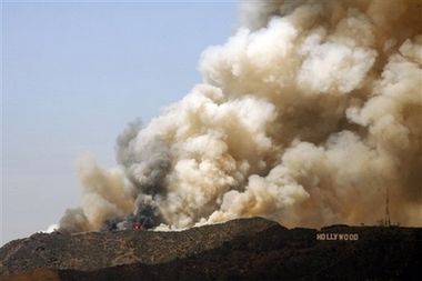 A wildfire burns in the Hollywood Hills area of Los Angels on Friday, March 30, 2007. The 24-acre fire started next to the Oakwood Toluca Hills, a corporate housing complex northwest of downtown, and spread up the north face of the hills.