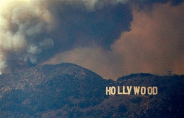 A wildfire burns in the Hollywood Hills area of Los Angeles on Friday, March 30, 2007. The 24-acre fire started next to the Oakwood Toluca Hills, a corporate housing complex northwest of downtown, and spread up the north face of the hills. 
