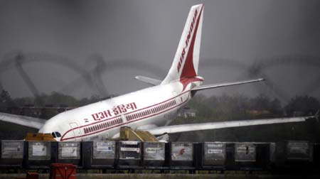 An Air India Airbus A310 is seen after it made an emergency landing at the international airport in New Delhi April 9, 2007. Two Air India planes made emergency landings on Monday at New Delhi's international airport, with the nose of one aircraft later hitting the ground as its front undercarriage collapsed while being towed away. 