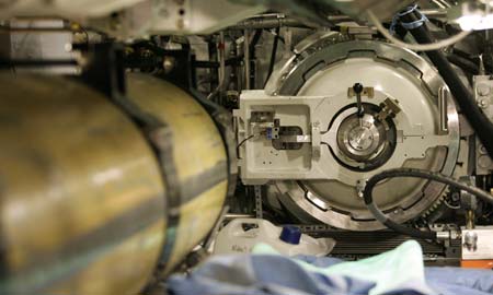 dummy Tomahawk cruise missile lies next to a weapons system delivery tube onboard one of the first two Astute class nuclear submarines as they are built in the Devonshire Dock hall at the BAE systems facility in Barrow-in-Furness, northern England, May 8, 2007. The first of Britain's new class of nuclear submarines is expected to be launched in June 2007 and enter into active service late in 2008.