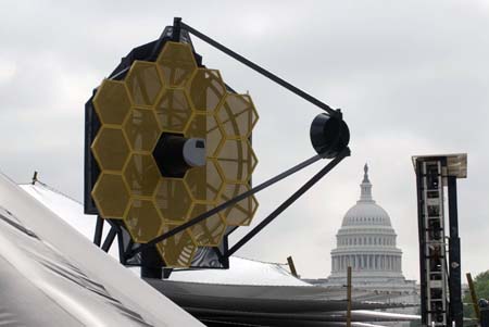 A full-scale model of the Webb Telescope is on display at the National Mall in Washington, May 10, 2007. The successor to the Hubble, the Webb Telescope will be launched in 2013 to explore the formation of the first stars and galaxies in the Universe. 