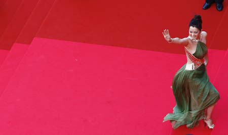 Gong Li arrives for an evening gala screening of Chinese director Wong Kar Wai's in-competition film 