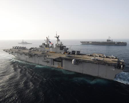 U.S. warships carrying 17,000 personnel enter the Gulf in a show of force off Iran's coast that navy officials said was the largest daytime assembly of ships since the 2003 Iraq war, in this handout photograph taken May 22, 2007. U.S. Navy officials said Iran was not notified of plans to sail nine ships, including two aircraft carriers, through the Straits of Hormuz, a narrow channel in international waters off Iran's coast and a major artery for global oil shipments. Picture taken May 22, 2007.