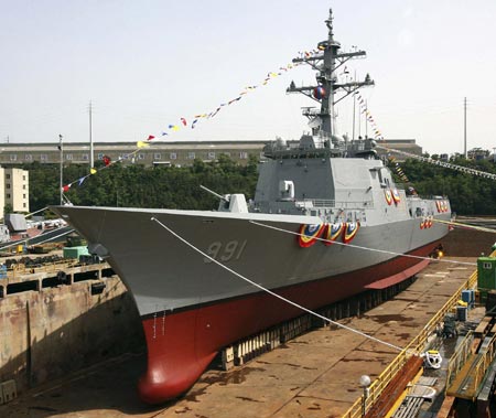 South Korean first Aegis destroyer, named after King Sejong, is seen at a shipbuilding yard of Hyundai Heavy Industries in Ulsan, about 410 km (256 miles) southeast of Seoul, May 25, 2007. South Korea on Friday launched a destroyer, its first with an advanced weapons system for shooting down enemy missiles and aircraft.The ship, with the high-tech Aegis weapons system, can carry 16 ship-to-ship missiles, 128 ship-to-air missiles as well as cruise missiles and torpedoes, the Defence Ministry said. [Reuters]
