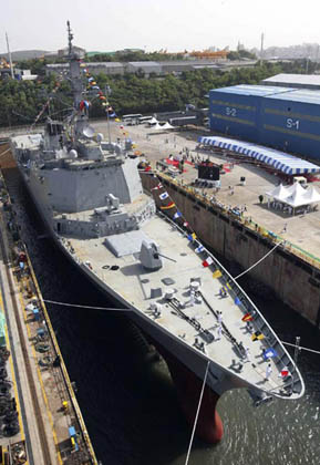 South Korean first Aegis destroyer, named after King Sejong, is seen at a shipbuilding yard of Hyundai Heavy Industries in Ulsan, about 410 km (256 miles) southeast of Seoul, May 25, 2007. South Korea on Friday launched a destroyer, its first with an advanced weapons system for shooting down enemy missiles and aircraft.The ship, with the high-tech Aegis weapons system, can carry 16 ship-to-ship missiles, 128 ship-to-air missiles as well as cruise missiles and torpedoes, the Defence Ministry said. [Reuters]