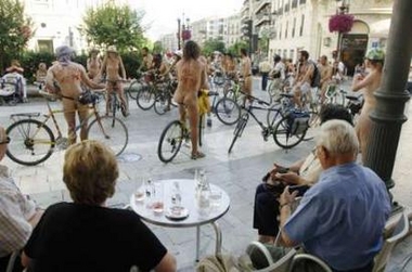 Naked people take part in a cycling protest against pollution during the World Naked Bike Ride Day in Granada June 9, 2007. The aim of the worldwide event is to protest against the dependency on oil and the car culture.
